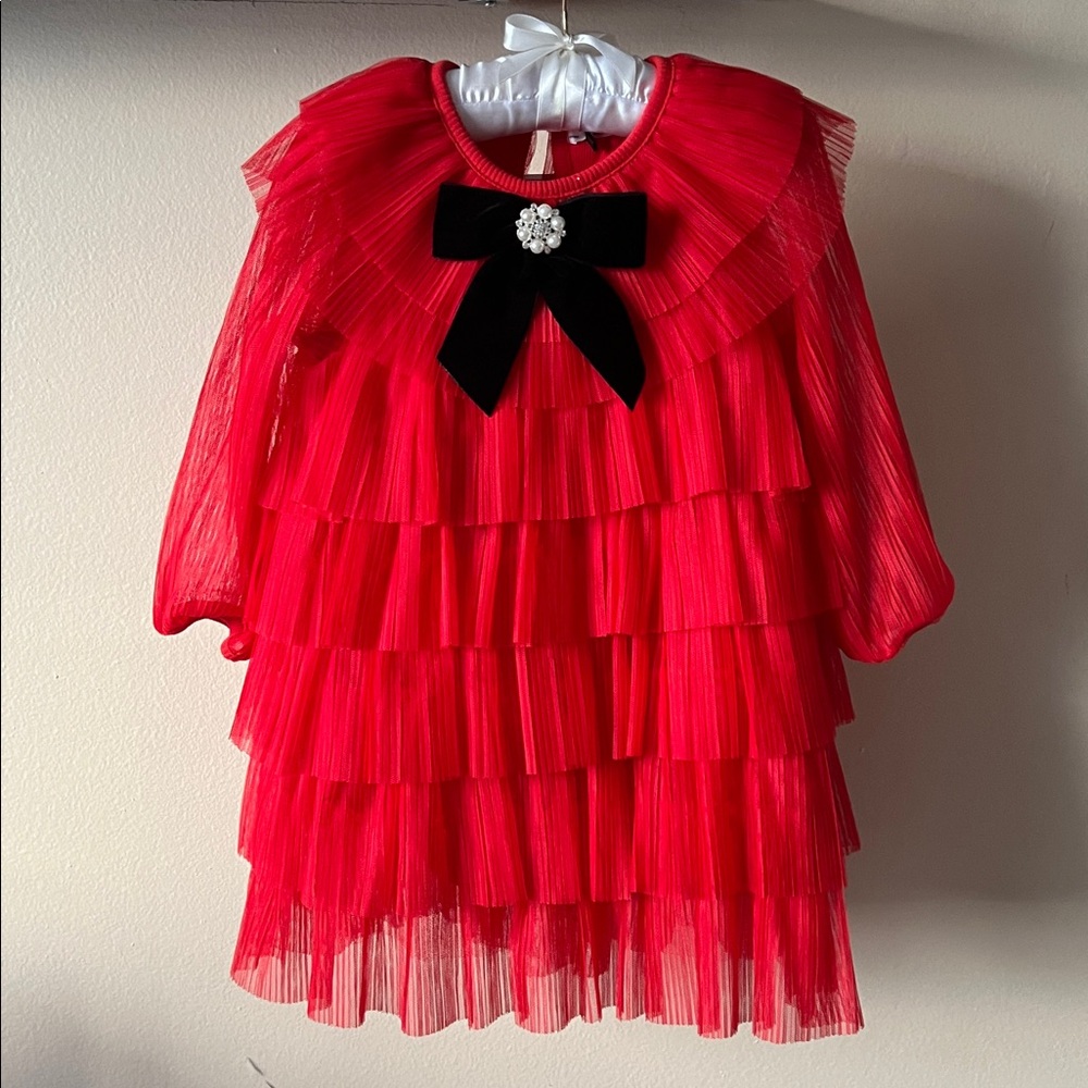 Elegant Red Tiered Dress with Black Bow